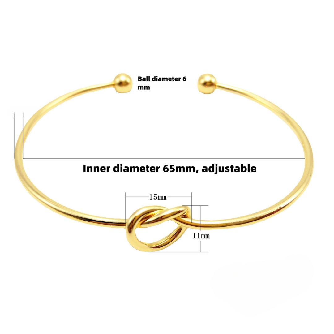 14K Gold Knotted Bangle That Symbolises Love & Draws Compliments
