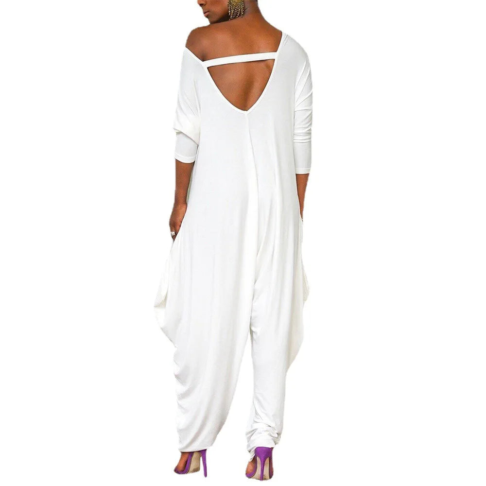 Isleen - Asymmetrical Off-Shoulder Jumpsuit with Tapered Legs