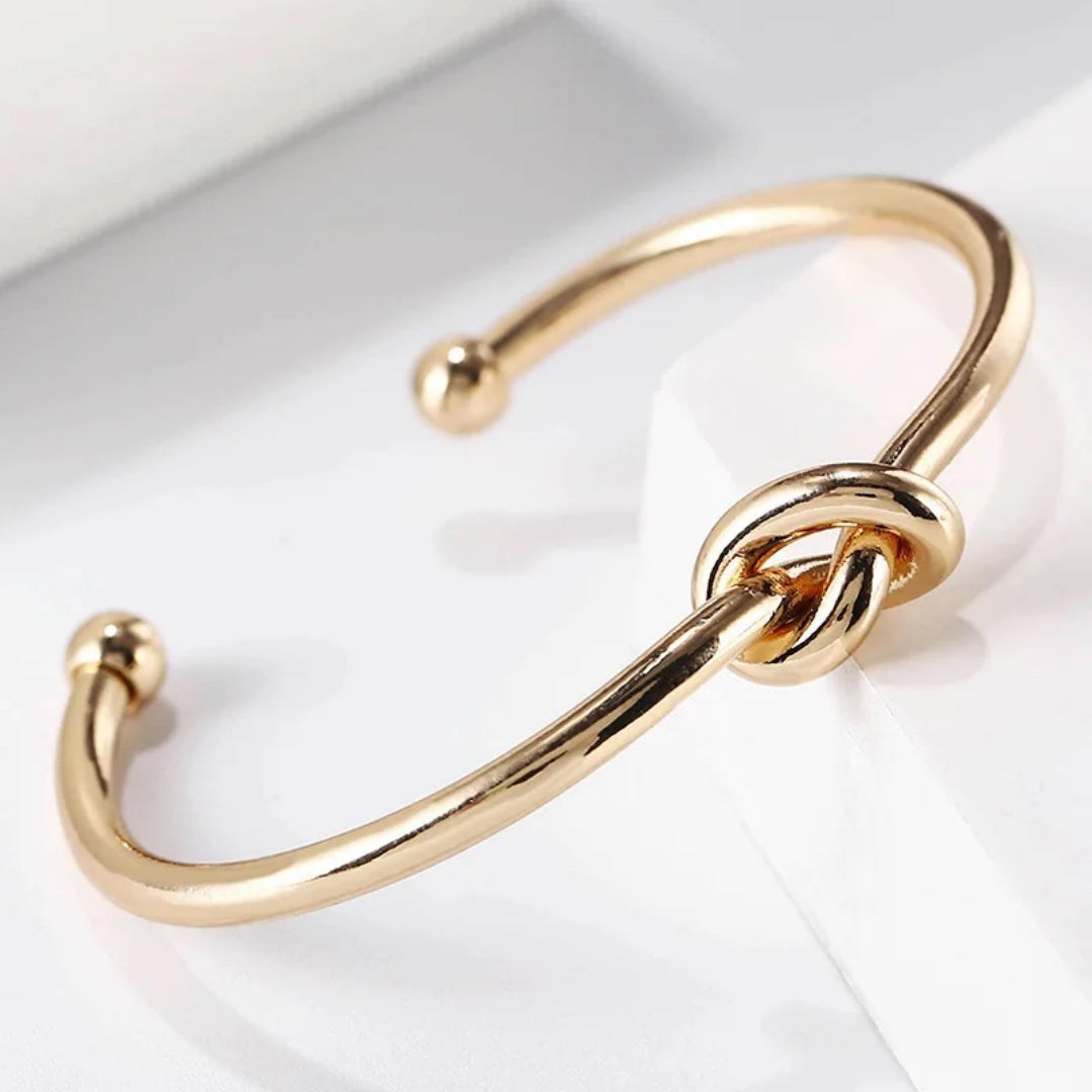 14K Gold Knotted Bangle That Symbolises Love & Draws Compliments