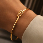 14K Gold Knotted Bangle That Symbolises Love & Draws Compliments