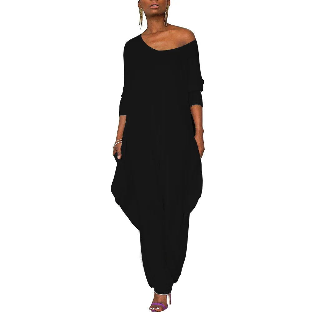Isleen - Asymmetrical Off-Shoulder Jumpsuit with Tapered Legs
