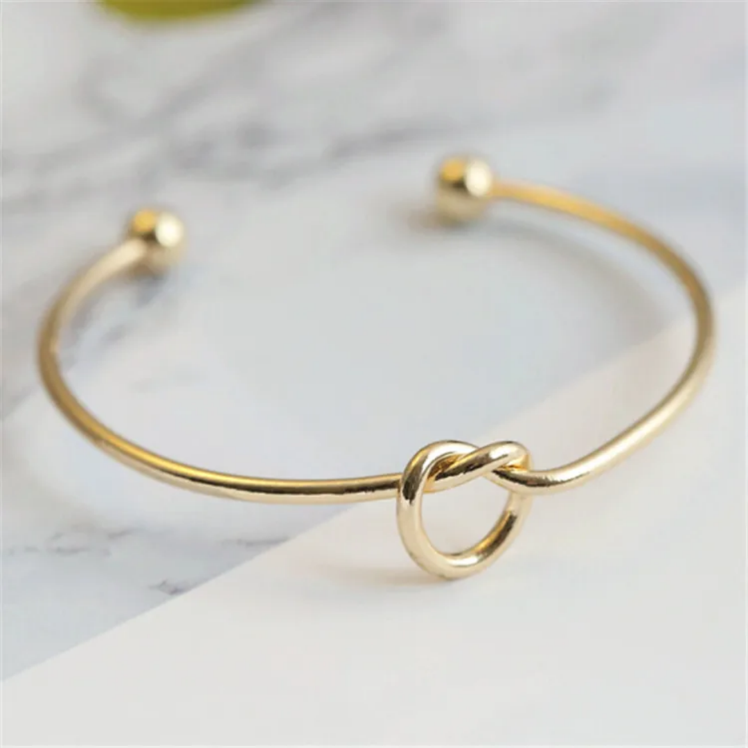 14K Gold Knotted Bangle That Symbolises Love & Draws Compliments