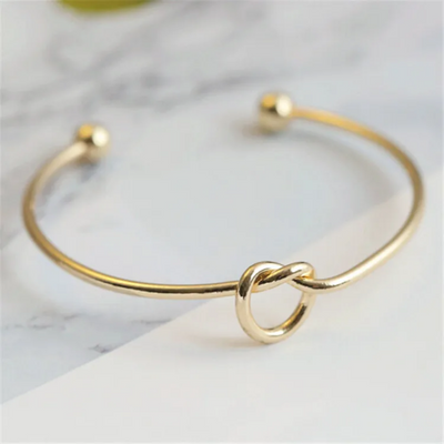 14K Gold Knotted Bangle That Symbolises Love & Draws Compliments