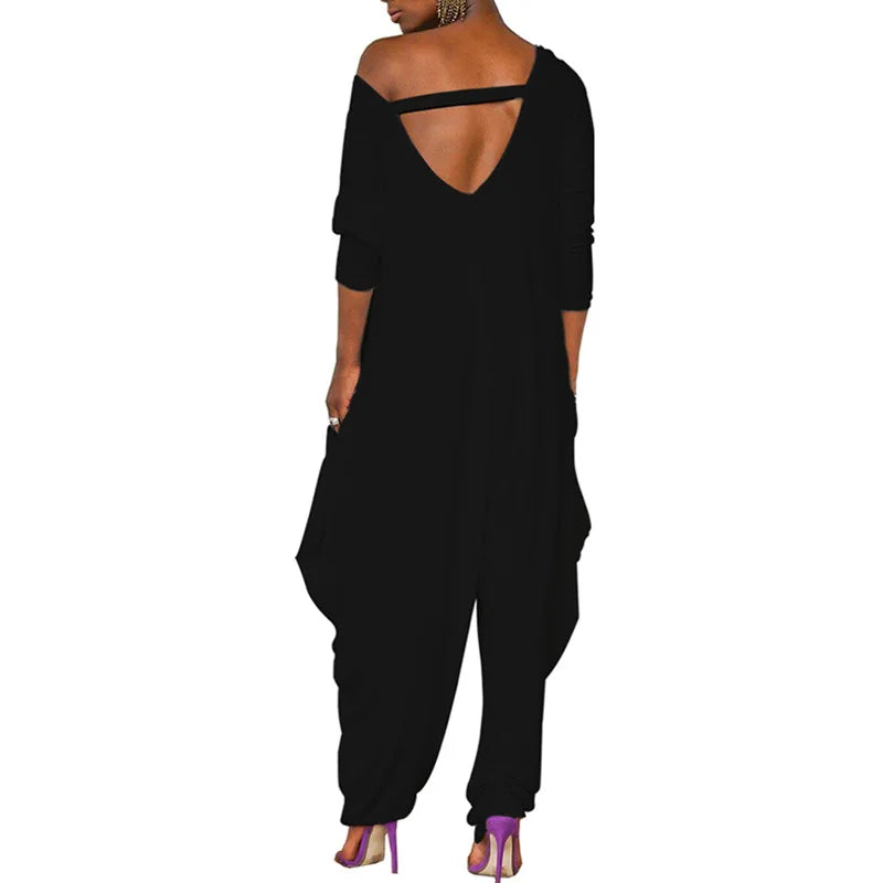 Isleen - Asymmetrical Off-Shoulder Jumpsuit with Tapered Legs