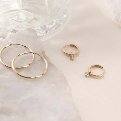 14K Gold Diamond Hoops That Add a Touch of Luxury & Capture Every Gaze